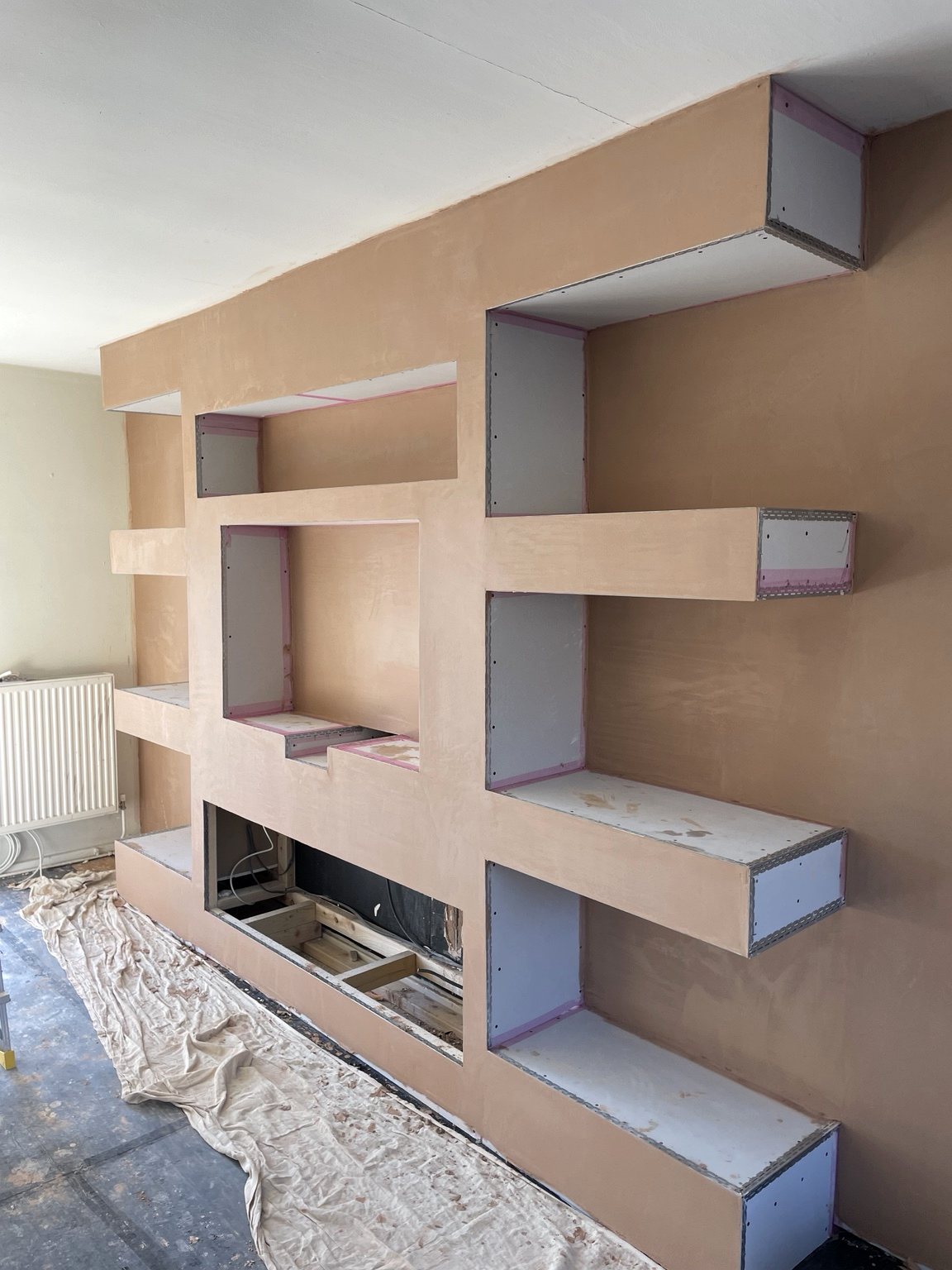 Media wall during plastering